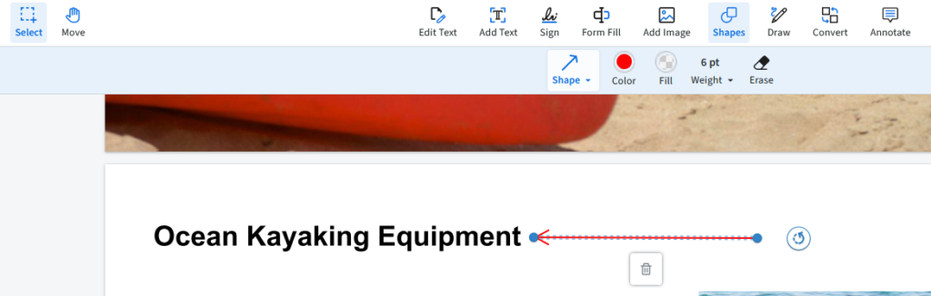 A red arrow points to the title that reads ocean kayaking equipment. 